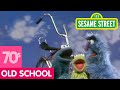 Sesame Street Cookie And Herry Share A Bicycle