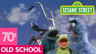 Sesame Street: Cookie and Herry Share A Bicycle