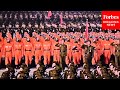 Photos Of North Korea S National Day Military Parade Show People Marching In Hazmat Suits Forbes