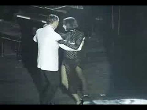  Osvaldo Zotto  and  Lorena Ermocida  are  dancing  to  the  tango  "  Los Mareados  "