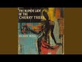 The Blonde Lady of the Cherry Trees
