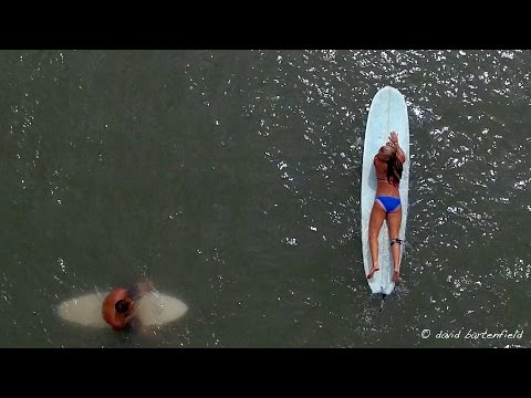 Drone footage of Crystal Pier and surfers