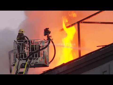 Firefighters tackle the flames after deadly Russian attack in Ukraine