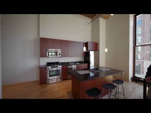 Floor-to-ceiling views from a Motor Row Lofts corner unit