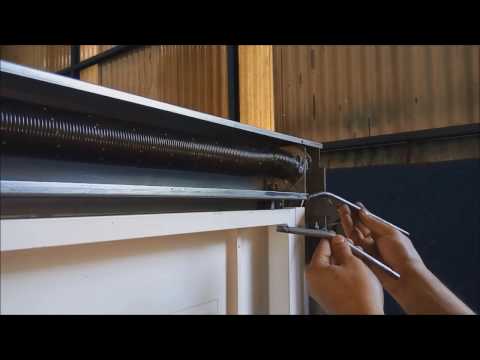 Como dar tensão na mola do portão Slimtech Portatoldo