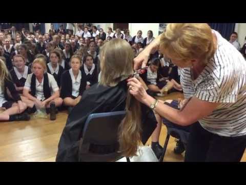 Getting a hair cut for World's Greatest Shave at school