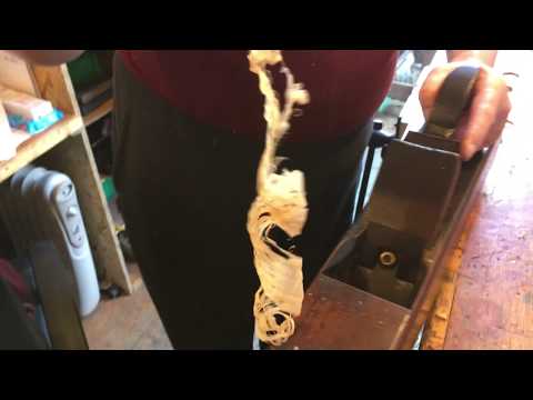 Testing a sharpened wooden plain