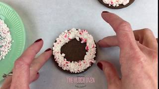 How to frost a variety of Christmas cookies using buttercream frosting.