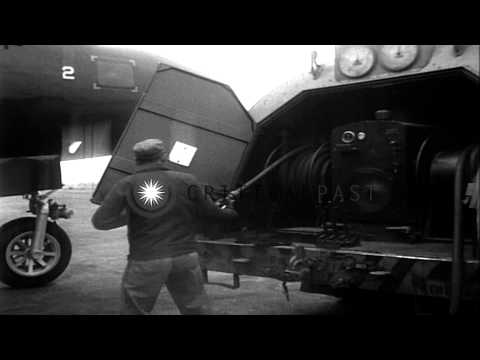 AO load ammunition in nose guns of US Navy Lockheed P2V Neptune and clean out gun...HD Stock Footage