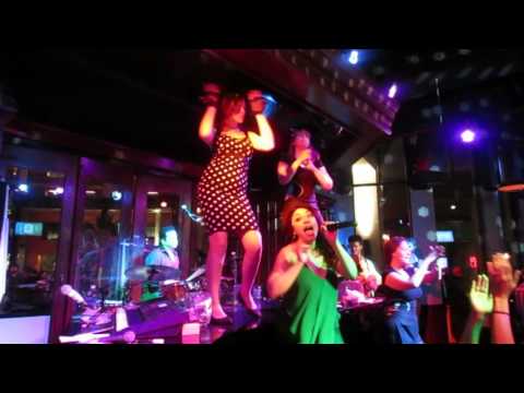 Howl at the Moon Servers Dance on Stage to a Cover of Shake it Off!