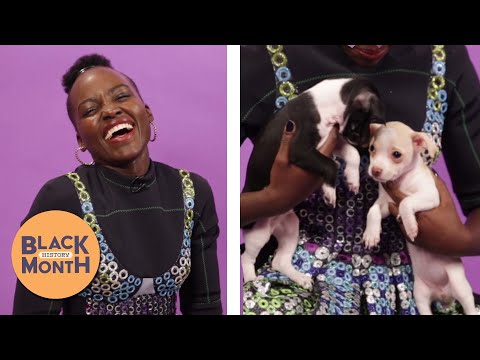 "Black Panther's" Lupita Nyong'o Plays With Puppies (While Answering Fan Questions)