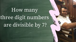 How many three digit numbers are divisible by 7?