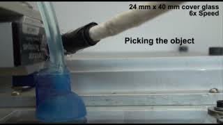 Soft Grippers Using Micro-fibrillar Adhesives for Transfer Printing(a glass larger than the gripper)