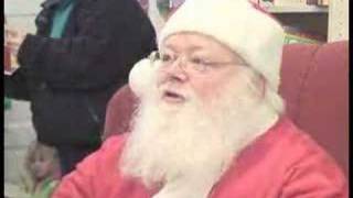 Santa Claus reads at Apple Blossom Book Store