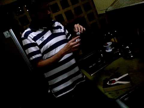 A person is taking medicine while sneezing on a book