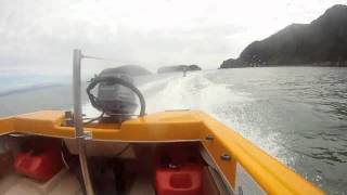 Tata Beach-Surfing behind boat