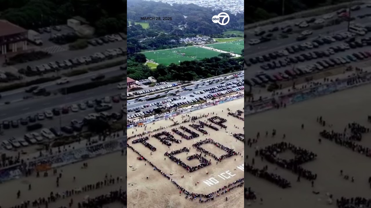 San Francisco protesters make human sign at Ocean Beach