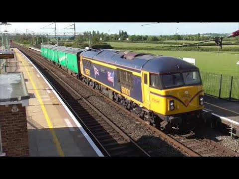GBRf 69001 passing Cheddington hauling 2 barrier coaches 15/06/22