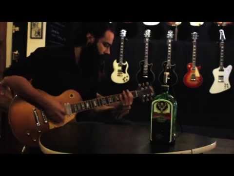 Xtonebox Jager-Amp portable guitar amplifier in a liquor bottle of Jagermeister. Cigar Box Amp image 6