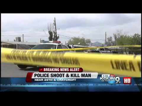 Breaking News: Police shoot armed man inside doghouse