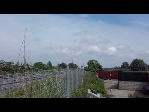 Enterprise DD set 9001 with IE 201 Class loco No.227 passing Maze.