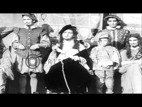 Men and women dressed in beautiful medieval costumes for the festival Quintana of...HD Stock Footage