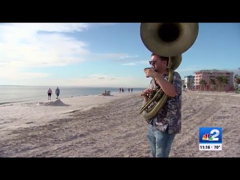Fort Myers Beach ‘Tuba Guy’ returns to island for first time since Hurricane Ian
