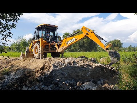 JCB Earth Movers Breaking Old Concrete Bridge and Throwing Out Stone - JCB Video