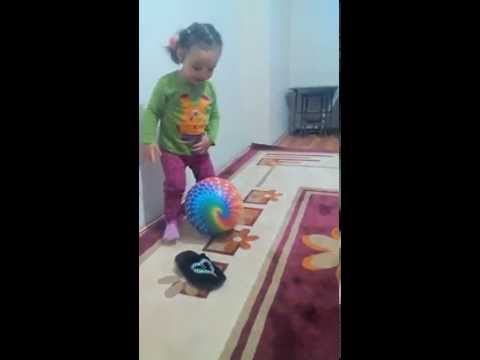 Laughing Baby:playing ball
