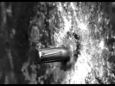Bullet hitting wall (high-speed camera slow motion)