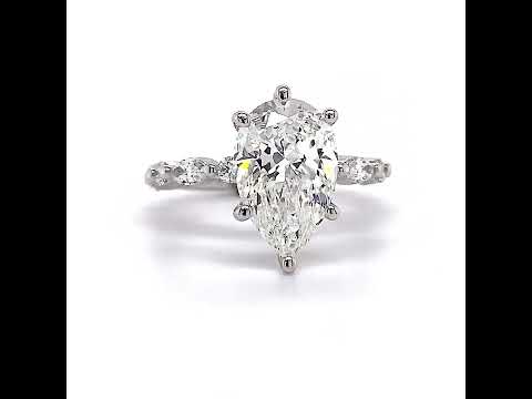 Marquise and Round Single Prong Scalloped Moissanite Marquise and Round Single Prong Scalloped Moissanite