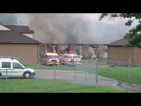 Crews battle large fire in Whitewater Township boat storage facility