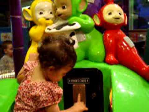 Carrah at Chuck E Cheese 2002 on Teletubbies Ride