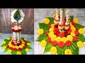 Annapakshi kuthu vilakku decorations with peacock feather | அன்னப்பட்சி குத்து வி