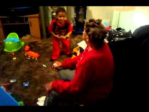 Bad little boy beats his grandma.