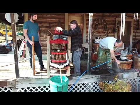 Hand Pressing Apple Cider In Orient Washington