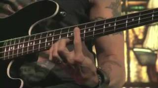 Behind the player Duff McKagan bassist for Velvet Revolver a College video