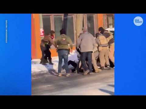 Minneapolis shooting video analysis: Gun appears to be taken from Alex Pretti before he was shot