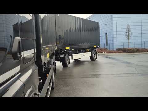 LKW Fahrschule Grundfahraufgabe CE Rückwärtslinksbogen zum Umkehren für Fahrschüler.