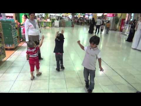 nayef playing with bubbles outside circus land doha qatar