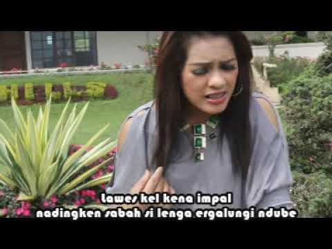 TEGUN LOLO By. Rimta Maryani Br. Ginting