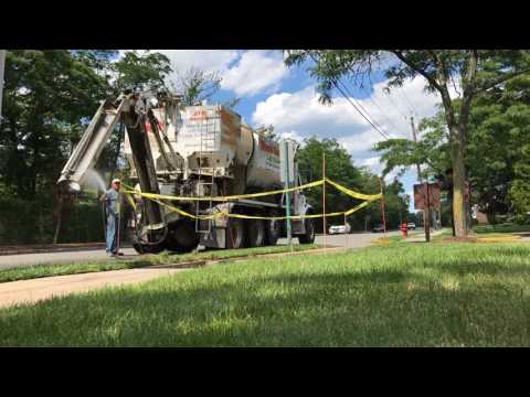 Concrete Chute Being Washed Out.