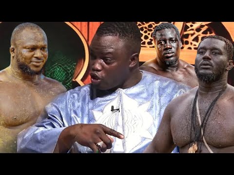 5 Tonnes tape sur la table et jure Modou Lo day dann Sa Thies 