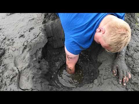 Digging Geoduck in the Puget Sound.