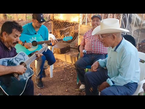 "Ezequiel Rodríguez" Miguel Montoya and his father singing at the ranch with friends
