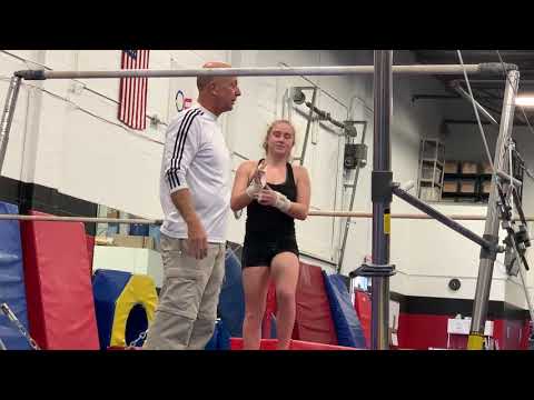 Bail Movement - flying from the upper bar to the lower bar with a half turn.