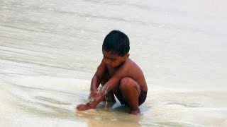 Child Playing at Jolly Buoy Beach