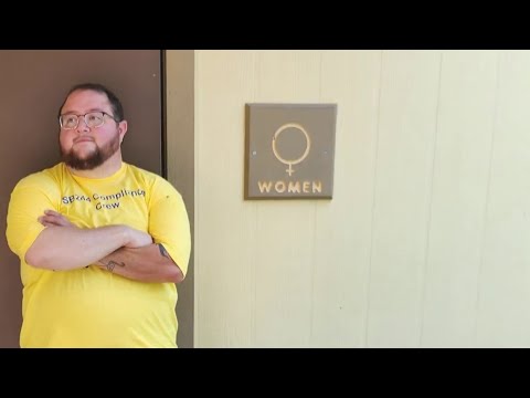 Kansas trans men protest state's bathroom law by following it