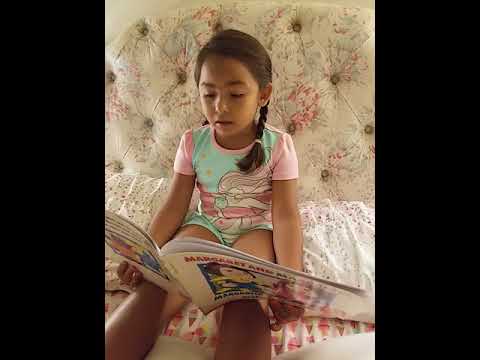 Leyendo en dos idiomas. Reading both languages in parallel.