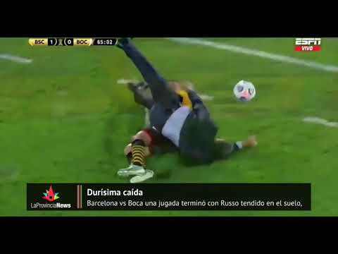 Durísima caída, Russo tendido en el suelo